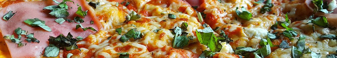 Eating Pizza at Pizza Capri Hyde Park restaurant in Chicago, IL.
